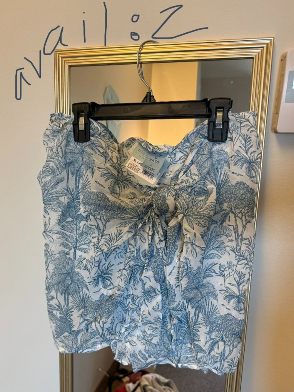 Shade & Shore short blue sarong. Slightly sheer with a tropical pattern. Size XL